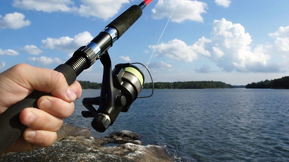fishing rod and a lake